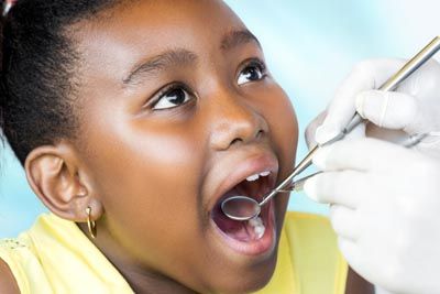 young girl getting a dental checkup at North Atlanta Family Dentistry in Cumming, GA