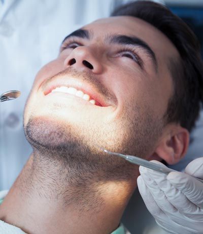man smiling during his appointment at North Atlanta Family Dentistry