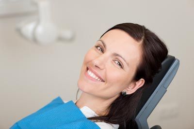 woman smiling during her appointment at North Atlanta Family Dentistry in Johns Creek, GA