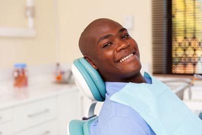man smiling during his first visit to North Atlanta Family Dentistry in Johns Creek, GA