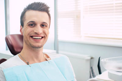 man smiling at his same-day appointment at North Atlanta Family Dentistry